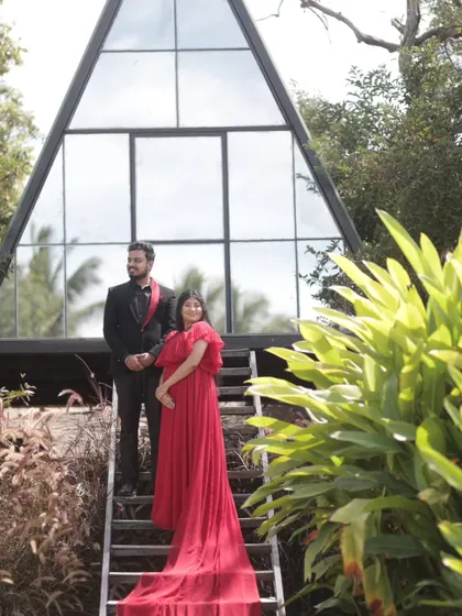 A change of outfit to a stunning red gown for a more dramatic look. The makeup was versatile enough to transition from the soft daytime look to this bolder evening style.