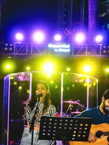 Performing under the stars and stage lights at a SteppinOut by Dineout event. Every gig is a new memory, and I'm so thankful for each one.