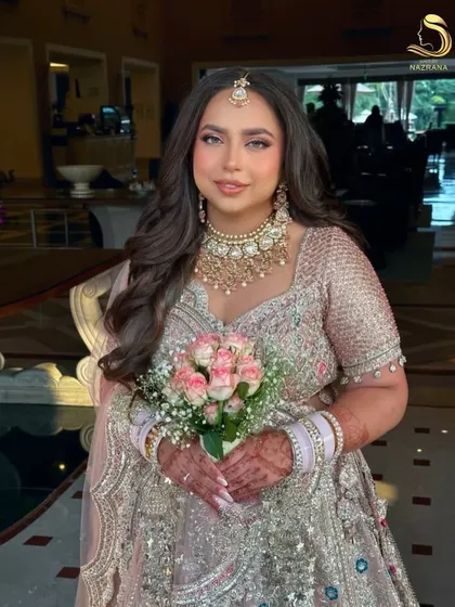 For the bride who loves minimalist charm, an open hair look can be pure magic. I styled these soft, romantic curls to frame her face beautifully, proving that sometimes the most simple styles make the biggest statement.
