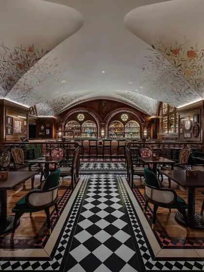 The vaulted ceiling and symmetrical layout create a grand, cathedral-like feel in the main space of the pub.