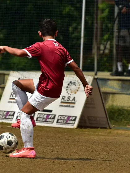 A player executes a skillful first touch to control the ball during the RSA Cup. This highlights the technical proficiency we instill in our U-11 and U-13 teams.