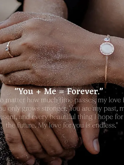 An artistic shot focusing on the couple's hands, adorned with sand, and a beautiful quote overlay that enhances the emotional depth.