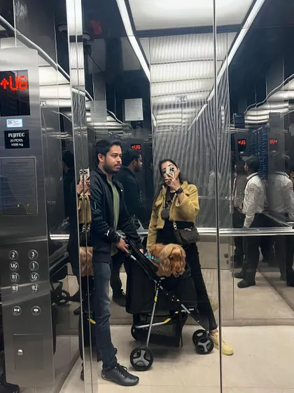 An elevator selfie with the whole family during our mall trip.