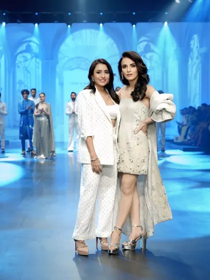 Radhika Madan posing with the designer. This shot celebrates the creative partnership behind the stunning runway look.