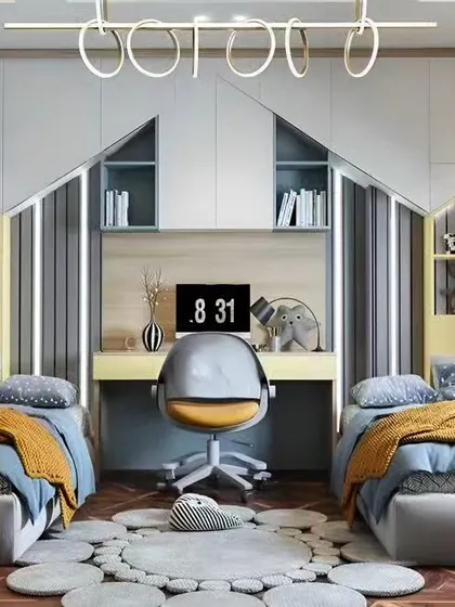 A stylish shared bedroom for two with symmetrical house-shaped headboards and a central shared desk. The mountain-themed wallpaper adds a touch of adventure.
