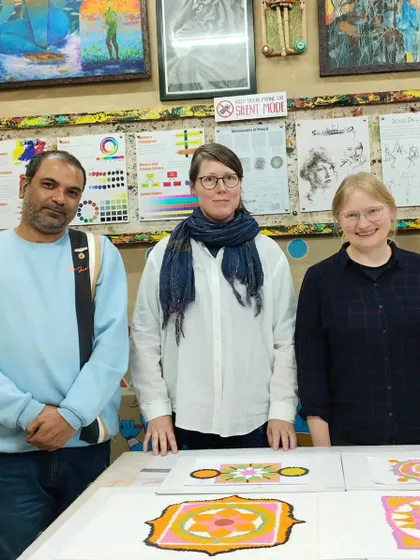 A group photo from our Rangoli workshop with international students. It was a wonderful exchange of culture and creativity.