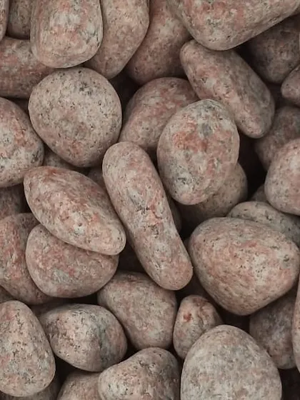 My unpolished red granite pebbles, which add a warm, earthy tone to garden designs.