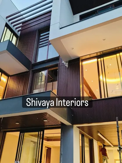 The right facade design comes alive at night with strategic lighting. For this project, I installed vertically grooved, deep-toned cladding that interacts beautifully with both natural and artificial light, highlighting the building's modern architectural lines.