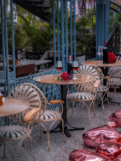 A romantic setting for Valentine's Day. With tables set for two, glasses of red wine, and a touch of romance in the air, the mansion becomes a haven for lovers.