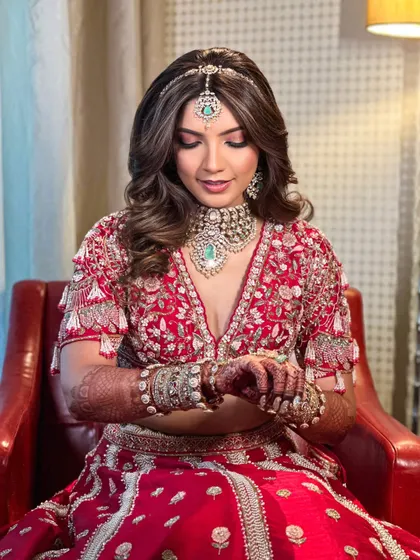 A closer look at Priyanka's soft bridal makeup. The eyes are subtly defined, and the skin has a luminous finish, creating a look that is both modern and timeless.