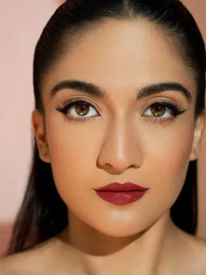 This look is a testament to the skills learned at the academy. A sharp liner and a bold lip are fundamental for any professional makeup artist.