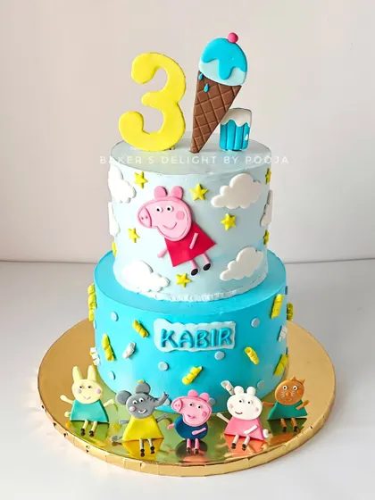 Another fun Peppa Pig cake, this time a two-tier design for Kabir's third birthday. I included all his favorite characters and a big ice cream cone on top, because what's a party without treats?