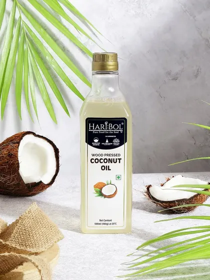 For this wood pressed coconut oil, I used natural elements like a coconut and palm leaves to emphasize its origin. The burlap and grey stone background add a rustic, organic feel.