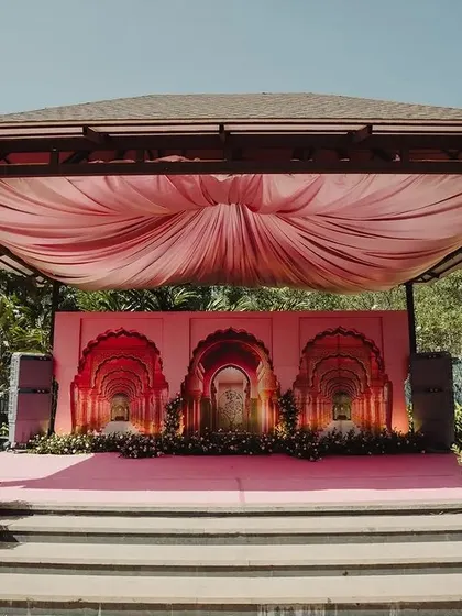 We brought the grandeur of Rajasthani palaces to this Sangeet stage. The backdrop features intricate arches inspired by Jaipur architecture, creating a royal and traditional setting for the pre-wedding celebration.