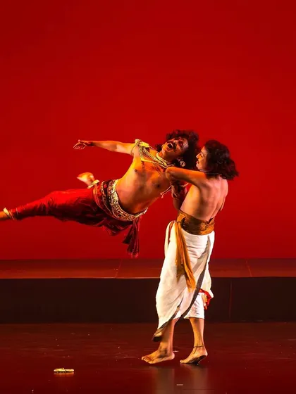My choreography often includes highly athletic and dramatic sequences. This action shot captures a dynamic lift, showcasing the strength and skill of the male dancers in our ensemble during a powerful theatrical performance.