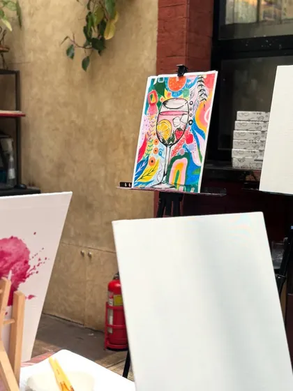 The setup for a private party, with blank canvases waiting for creativity to strike. The reference painting shows the theme, but I always encourage guests to make it their own.