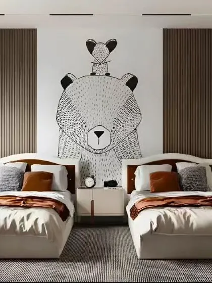 A modern kids' room with a striking bear mural, twin beds, and contemporary pendant lights.
