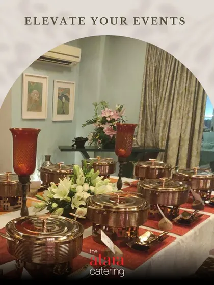 Our commitment to elegance is visible in every detail. This buffet setup features our premium copper chafing dishes and tasteful floral arrangements, showcasing how we elevate the dining experience beyond just the food.
