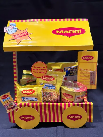 For the one who believes Maggi is an emotion, this Maggi-themed hamper cart is the ultimate tribute. It’s a fun and quirky gift idea, packed with different varieties of their favorite instant noodles.