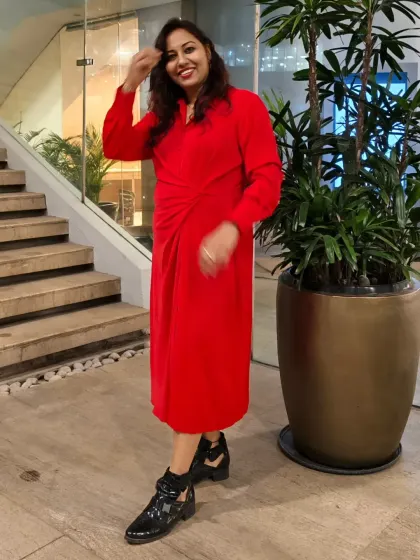 A candid, happy moment. A smile is the most important accessory for any host, and I am never without one.