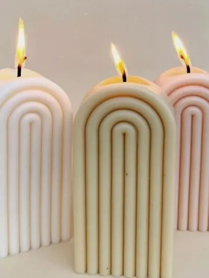 Our arch candles look beautiful when lit, creating a warm and modern ambiance.