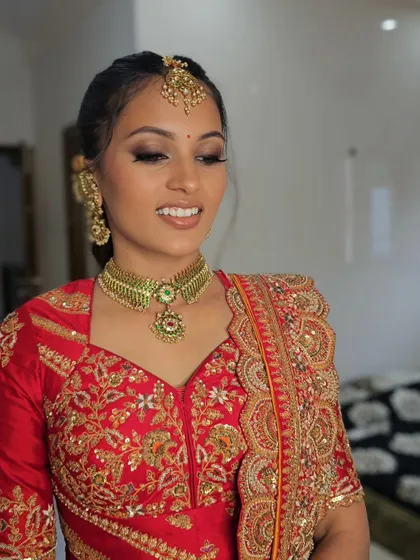 Nishra's smile shows her happiness with the final makeover.