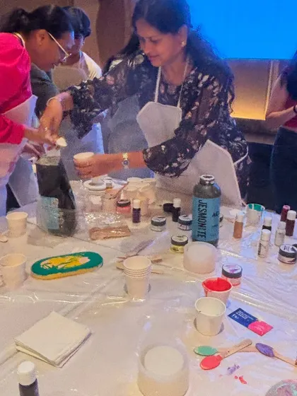 The messy, fun process of a Jesmonite workshop. From swirling colors to setting terrazzo chips, it's a truly hands-on experience.