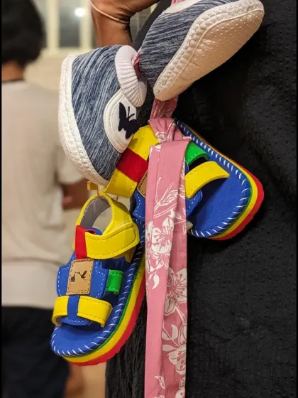 A close-up of a prop from 'Sea's Fire': children's shoes, a symbol of the stories we aimed to tell through our dance theatre production.