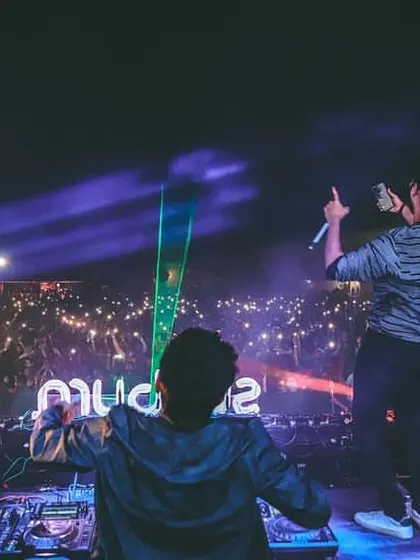 Another angle from our New Year's Eve set, hyping up the crowd as they light up the venue with their phones.