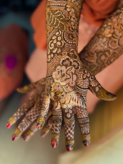 Another view of the personalized henna for Akbar's bride, showing the beautiful stain and intricate details.