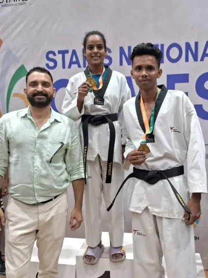 Celebrating our senior athletes' success on the national stage. Here are two of our black belt students on the podium at the Stairs National Games, a testament to their dedication and our elite training program.