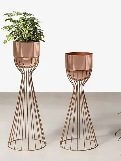 A second look at the rose gold Artful Foliage Planters. Their elegant design and warm metallic finish make them a stylish choice for housing your favorite indoor plants.