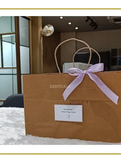 The hamper comes with a simple yet chic paper bag with a warning: 'Pretty Things Inside'.