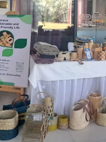 Our exhibition table showcasing a wide array of sustainable products. This display highlights the diversity of our offerings, from large laundry baskets and tote bags to smaller decorative items, all crafted with a commitment to eco-friendly living.