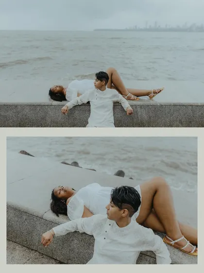 A creative and peaceful composition of the couple relaxing by the sea wall, capturing a moment of calm and connection.