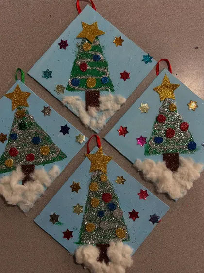 These sparkling Christmas tree artworks were made with glitter and cotton for snow. I love how each one has its own unique charm.
