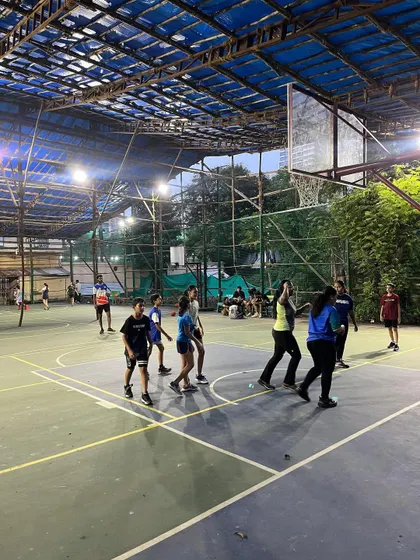 Here you can see a mix of our boys and girls during a practice game. The spacious court allows for full-game simulations, helping players develop strategic thinking.