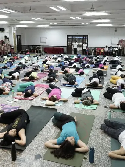 A moment of well-deserved Savasana (Corpse Pose) after our big community practice.
