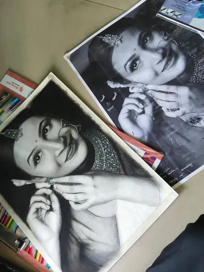 Here you can see the finished drawing next to the original reference photo. My goal is always to stay true to the source image while adding my own artistic touch to the final piece.