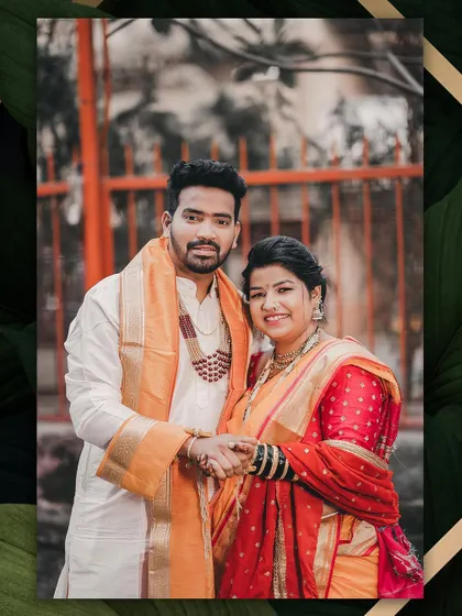 A formal portrait of the couple holding hands. They are dressed in traditional Maharashtrian wedding attire, ready to begin their new life together.