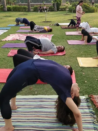 More backbends from our park yoga session. We guide students through poses like Bridge Pose and Wheel Pose to help open the heart and strengthen the back.