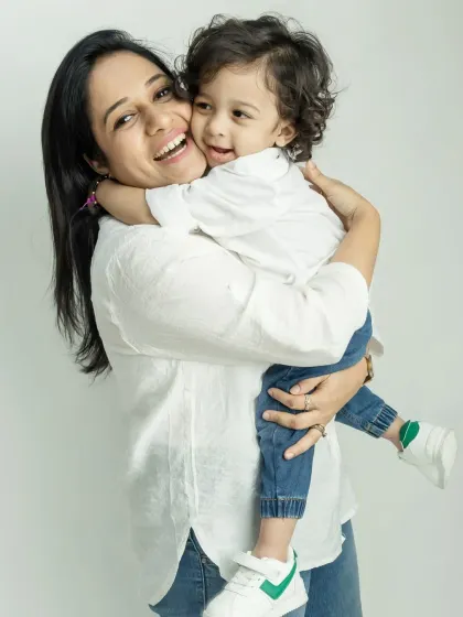 The pure joy in a mother's hug. These candid moments of love and laughter are what make family photoshoots so special.
