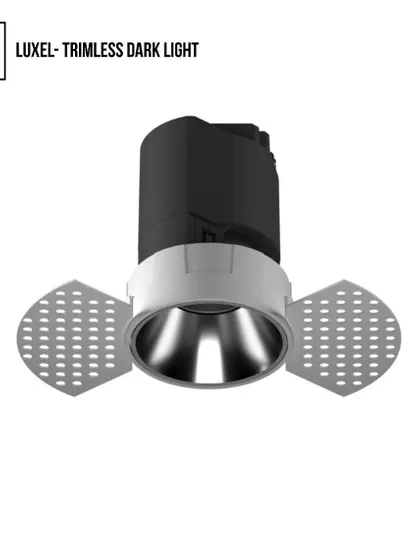 This is the trimless version of our Luxel Dark Light. The trimless design allows the fixture to be plastered into the ceiling, creating a seamless, fully integrated look where the light appears to emerge from the architecture itself.