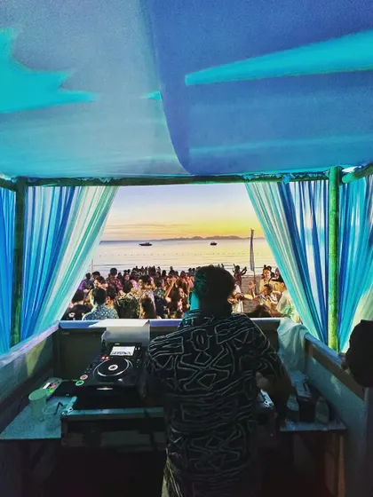 The view from my DJ booth as the sun sets over a beach party in Bali. Creating the perfect sunset soundtrack is one of my favorite things to do.