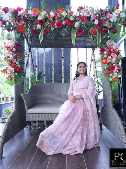 Another shot of the elegant baby shower decor, showing the beautiful mother-to-be in her special seat.