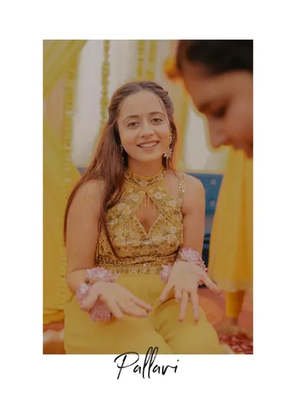 A lovely solo portrait of the bride during her Haldi ceremony, capturing her delicate features and happy expression.