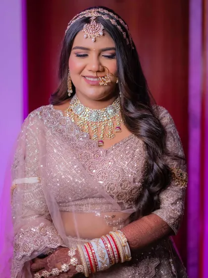 A close-up of this gorgeous bridal look. The soft smokey eye, defined brows, and glowing skin come together to create a look of timeless beauty.