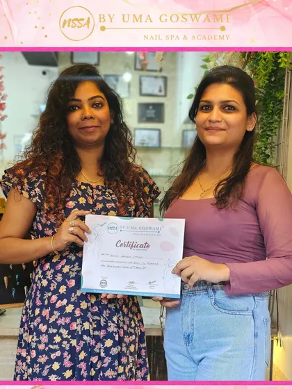 Pallavi with her well-deserved certificate. She completed two courses with us and is now ready for professional work.