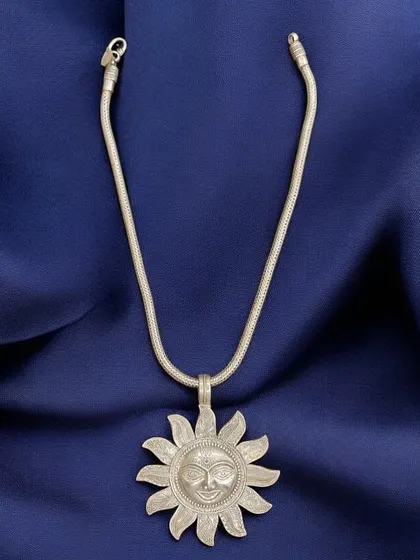 A premium pure silver necklace featuring a large, smiling sun pendant. This piece is hung on a thick, snake-like silver chain and has a wonderfully cheerful and bold presence.