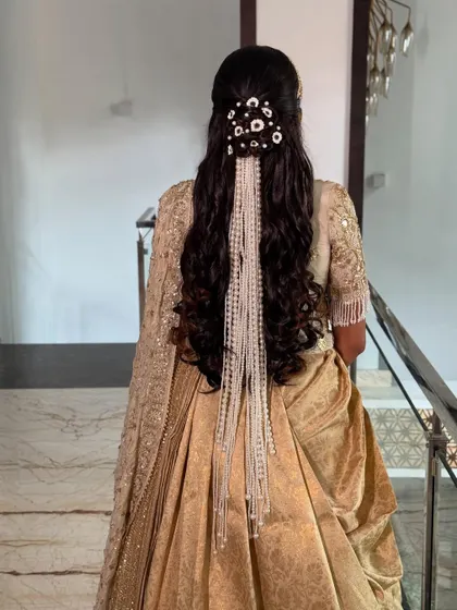 Another view of the cascading pearl hairstyle, showing how the accessory moves with the hair, creating a truly magical effect.